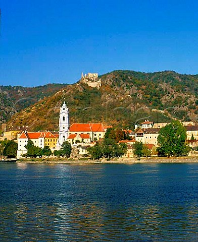 Durnstein and its baroque steeple viewed over the   Danube river from Rossatzbach The ruined castle on   the hill is where Richard the Lionheart was   imprisoned  Niedersterreich Austria   Wachau