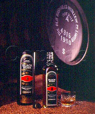 Bottle and glass of Black Bush Whiskey in warehouse   of Old Bushmills Distillery Bushmills CoAntrim   Northern Ireland