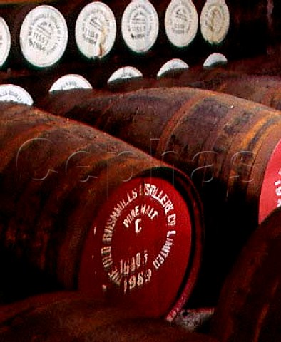 Barrels of malt whiskey maturing in the atmospheric   No7 warehouse of the Old Bushmills Distillery   Bushmills CoAntrim Northern Ireland