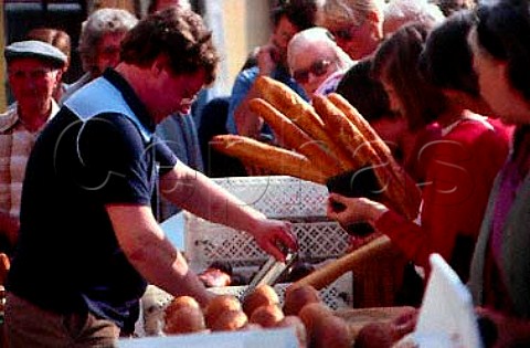 Bread stall in village market MarignyenOrxois Marne France
