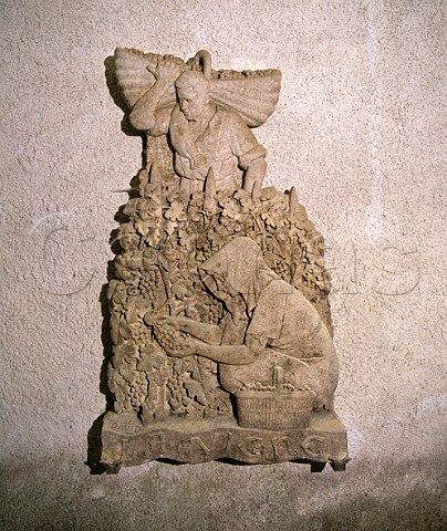 Relief of a vineyard harvest scene in the cellars of Patriarche Pere et Fils Beaune Cte dOr France