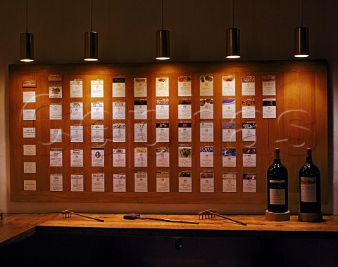 Display of wine bottle labels of Chteau   MoutonRothschild Since 1945 the labels have been   illustrated by famous artists Pauillac Gironde   France   Mdoc  Bordeaux