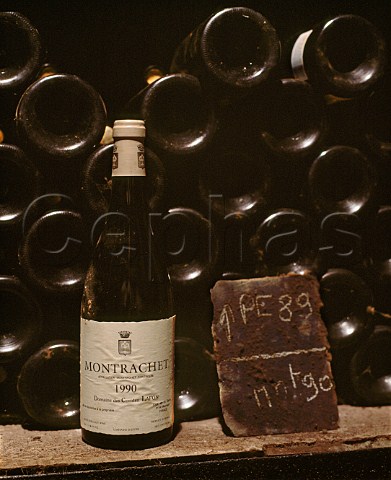 Bottle of 1990 Montrachet Grand Cru in the vintage bottle cellar of Domaine des Comtes Lafon Meursault Cte dOr France