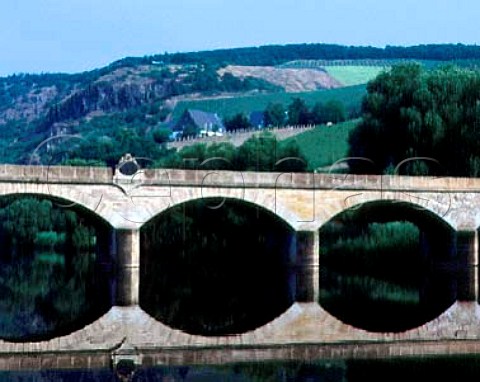 Bridge over the Nahe river with beyond the Staatsweingut at the foot of the Kupfergrube vineyard Copper Mine Schlossbckelheim   Germany     Nahe