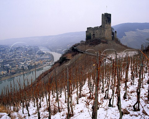 Burg Landshut above BernkastelKues and the Mosel River The vineyard in foreground faces northwest and is snow covered that below the castle southwesterlyand the famous southfacing Doctor in the distance top right are snow free In this northerly region the aspect of slope is crucial to the ripening of the Riesling grape Germany