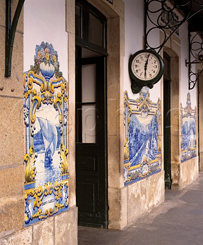 Traditional azulejos tiles depicting wine scenes on   the railway station at Pinho in the Douro Valley   Portugal   Port