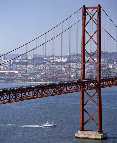 The 25th April Bridge over the Tagus Estuary with  Lisbon beyond Portugal