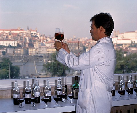 Oenologist Luis de Sottomayor blending Ferreiras   Quinta da Porto 10 year old port in their laboratory   overlooking Porto and the Douro River   Portugal