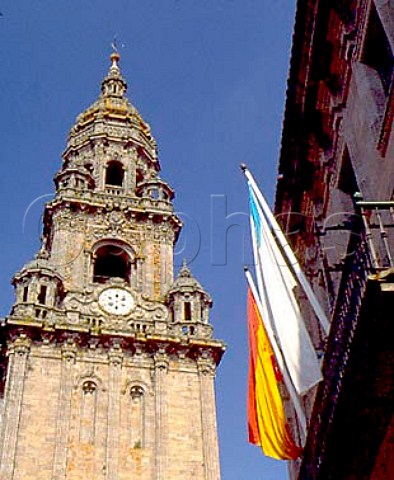The flags of Spain and Galicia with one of the   towers of the Cathedral Santiago de Compostela   Galicia Spain