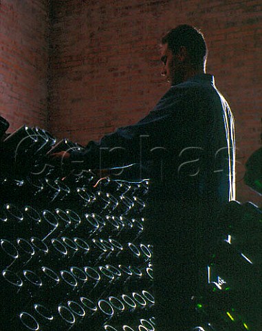 Performing the remuage on bottles of Cava in the   cellars of Raventos i Blanc Sant Sadurni dAnoia   Catalonia Spain