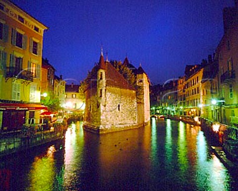 The Palais de lIsle at night used as a residence   in the 12th century and later as a prison Built on   an island in the Canal du Thiou in Annecy near   Geneva  HauteSavoie France RhneAlpes