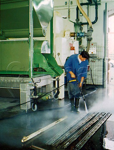 Cleaning the grape presses at Weingut   Dr BurklinWolf Wachenheim Pfalz Germany