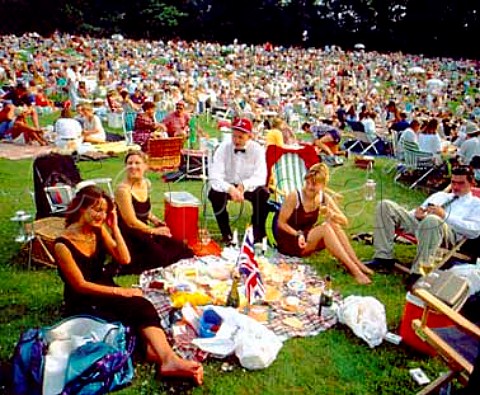 Annual openair concert held at Leeds Castle in June    July Many thousands of people spend the afternoon   and evening picnicing and listening to popular and   classical music  Kent England