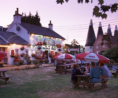 Evening drinking outside the Brown Trout pub   Lamberhurst Kent England