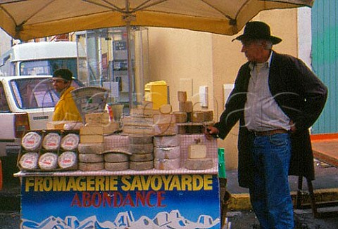 Savoyard cheese stall Market day in   IslesurSorgue Vaucluse France