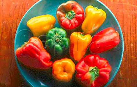 Bowl of different coloured peppers