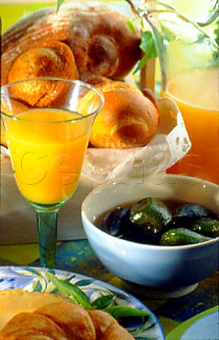 Green figs in syrup with bread and   orange juice