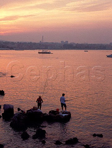 Fishing at dusk at Antibes on the Cote dAzur