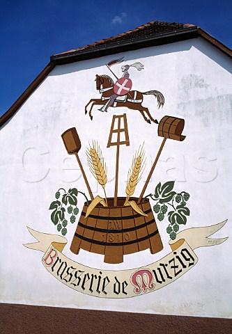Mural on one of the older brewery   buildings in Mutzig BasRhin France   Alsace