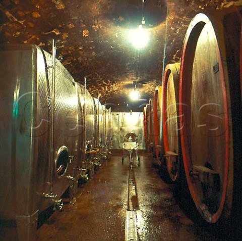 Stainless steel tanks and old barrels in the cellar   of Weingut Freiherr Heyl von Herrnsheim   Nierstein Germany  Rheinfront  Rheinhessen