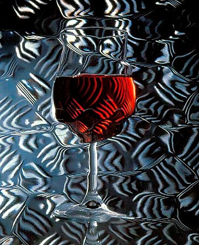 Glass of red wine  distorted
