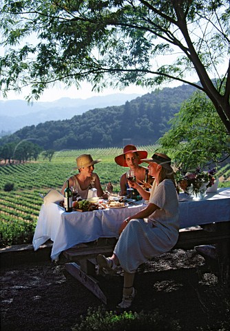 Women dining on the terrace of Joseph  Phelps Winery St Helena Napa Valley  California