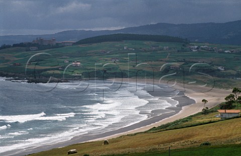 Oyambre beach with Comillas in distance  Cantabria Spain