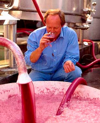 Peter Bright pumpingover a tank of fermenting   Merlot at the Fiuza Bright winery in Almeirim   Portugal  Ribatejo