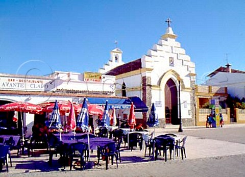 Restaurant and church on the waterfront in Sanlcar   de Barrameda Andalucia Spain