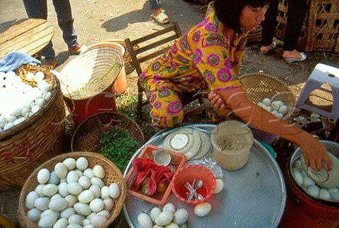 Selling fertilised duck eggs in Saigon Market Vietnam