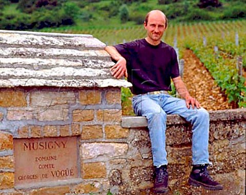 Eric Bourgogne viticulturist of   Domaine Comte Georges de Vog on the wall   of their section of Les Musigny vineyard  ChambolleMusigny Cte dOr France