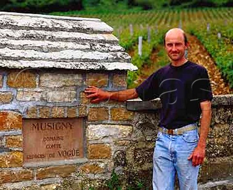 Eric Bourgogne viticulturist of   Domaine Comte Georges de Vog by the wall   of their section of Les Musigny vineyard  ChambolleMusigny Cte dOr France