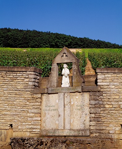 Marker denoting the border between the communes of PernandVergelesses and AloxeCorton in the wall at the foot of the hill of Corton Cte dOr France CortonCharlemagne  Corton