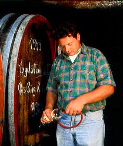 Johannes Leitz of Weingut Josef Leitz sampling wine   from cask in his cellars at Rdesheim Germany       Rheingau