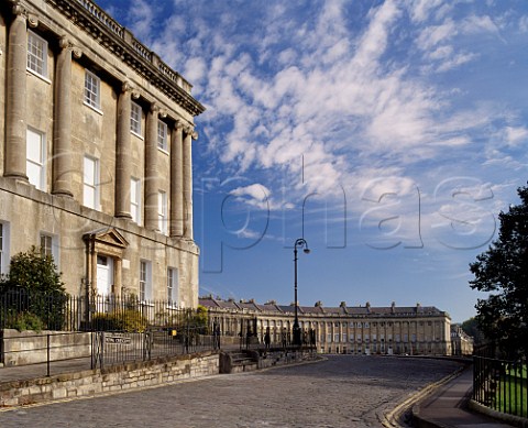 The Royal Crescent in Bath Designed by John Wood the Younger and built 176774 it comprises 30 houses in a 200m arc overlooking the town  Avon England