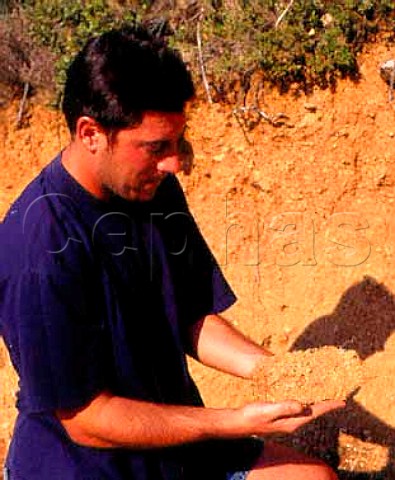 Samuel Guibert holds a sample of the unusual soil of   Mas de Daumas Gassac   Aniane Hrault France