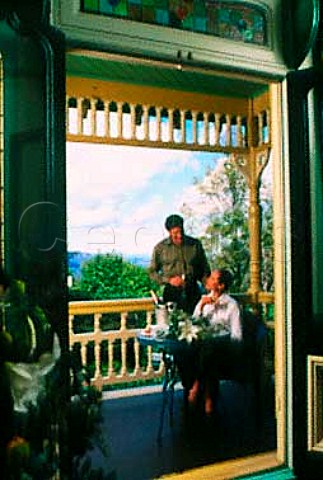 Couple enjoying Champagne on the balcony   of Lilienfels Hotel in the Blue Mountains New South Wales Australia