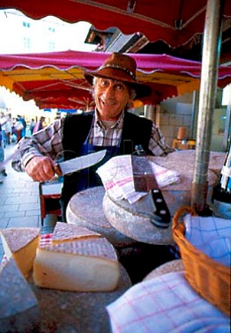 Cheese seller from Savoie in the market   at Beaune Cte dOr France