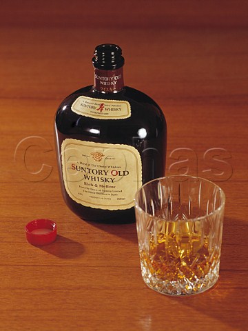 Bottle of Suntory Old Japanese blended Whisky with   glass