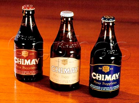 Bottles of Chimay Trappist beer brewed at Abbaye de   NotreDame de Scourmont Forges Belgium Capsule   Rouge 55 vol Capsule Blanch 63 and   Capsule Bleue 71