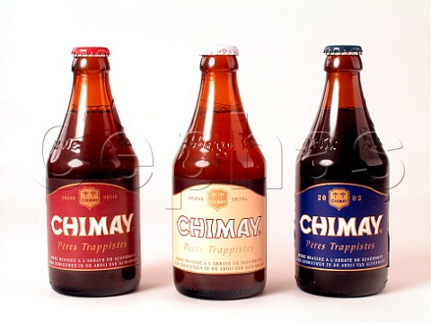 Bottles of Chimay Trappist beer brewed at Abbaye de   NotreDame de Scourmont Forges Belgium Capsule   Rouge 55 vol Capsule Blanch 63 and   Capsule Bleue 71