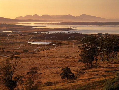 Sunrise view over Moulting Lagoon and Great Oyster   Bay to the Freycinet Peninsula on the east coast of   Tasmania Australia