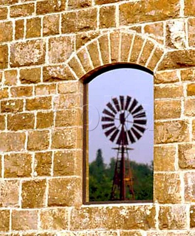 Windmill molino reflection in window of   Il Molino di Grace Panzano in Chianti Tuscany   Italy      Chianti Classico