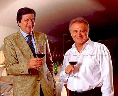 Consultant winemaker Franco Bernabei left with   estate manager Gerhard Hirmer sampling wine from   barrel in the chai of Il Molino di Grace   Panzano in Chianti Tuscany Italy    Chianti Classico