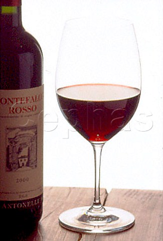 Glass and bottle of Montefalco Rosso   of Antonelli Montefalco Umbria Italy