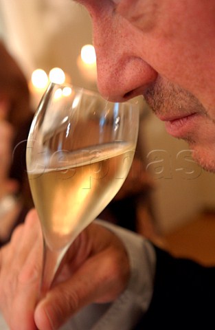 Sniffing champagne in a glass