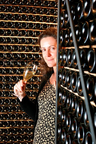 Lucia Barzano in bottle cellar of Il Mosnel winery   Camignone Lombardy Italy   Franciacorta
