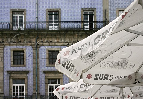 Parasols bearing the Porto Cruz brand in Praa da   Ribeira Porto Portugal