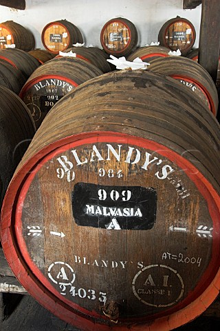 Barrels of vintage Madeira wine maturing by the   natural Canteiro process in one of the lofts of the   Old Blandy Wine Lodge Arcadas de So Francisco part   of the Madeira Wine Company Funchal Madeira   Portugal