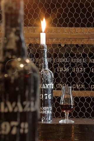 Bottle candles in the Vintage tasting room at the   Old Blandy Wine Lodge Arcadas de So Francisco part   of the Madeira Wine Company Funchal Madeira   Portugal